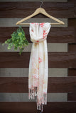 Luxuriously soft stole in white with peach flowers